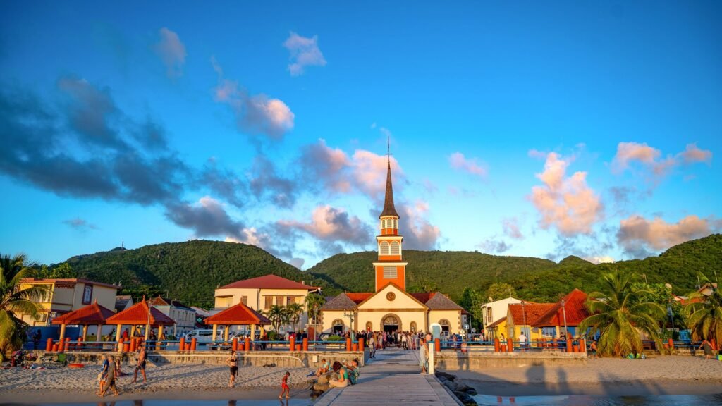A colorful view of Fort‑de‑France harbor at sunrise, showcasing the island’s blend of French and Caribbean architecture