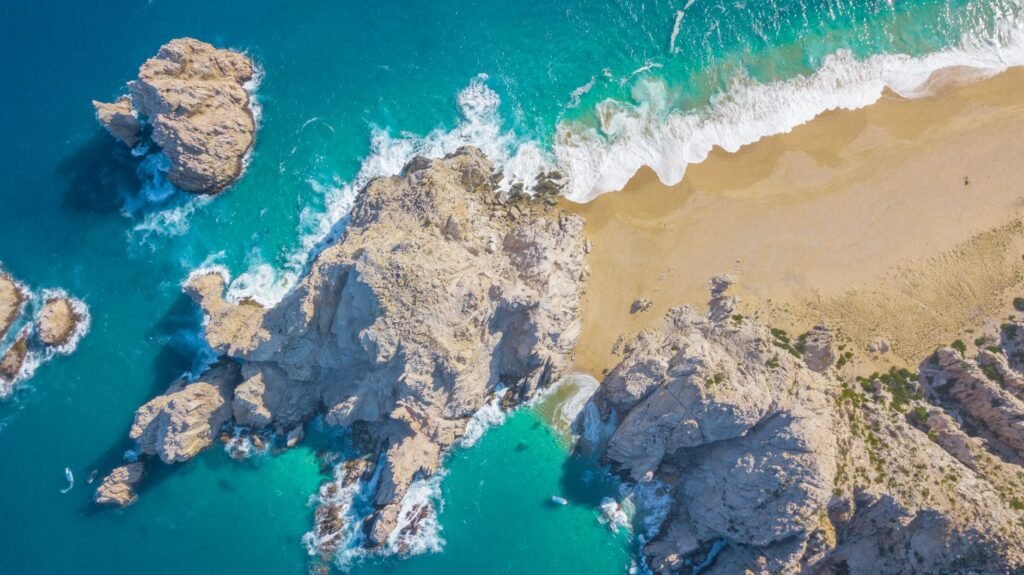 A panoramic view of San Jose del Cabo's coastline at sunrise, perfect for early‑morning beach walks