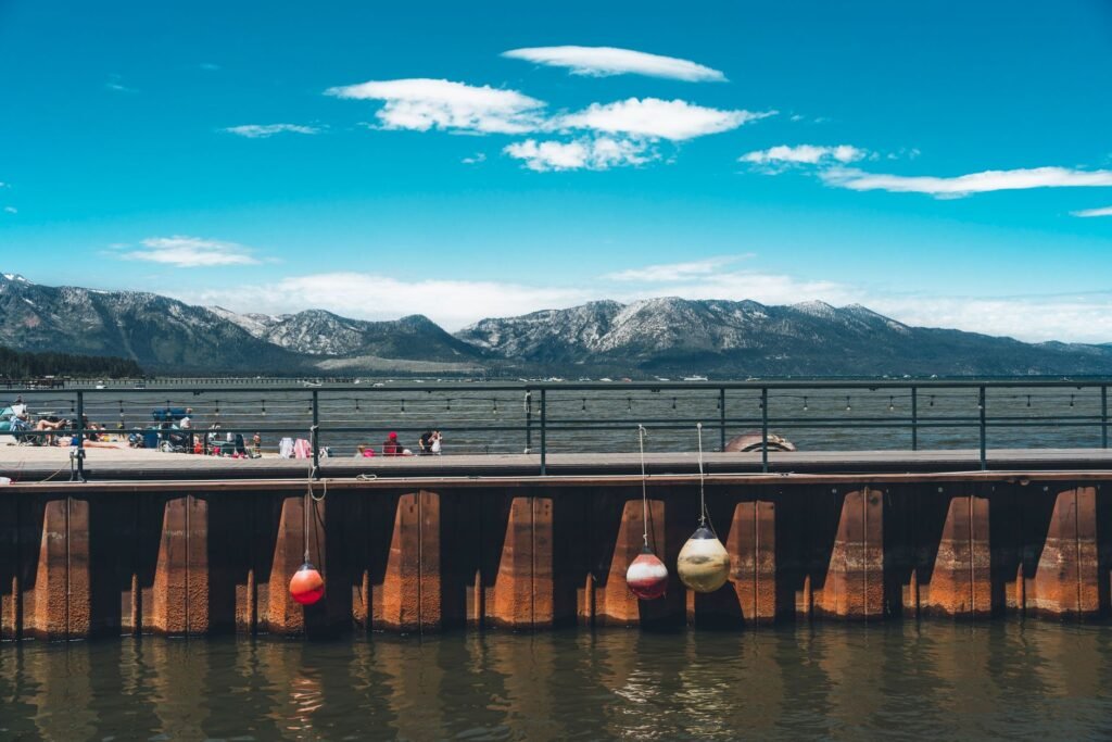 A sunset dinner at a lakefront restaurant showcases the sparkling water of North Lake Tahoe