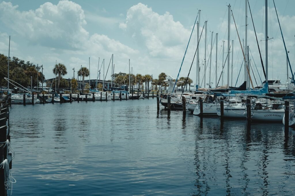 Boaters relaxing at the Palm Bay marina at dusk