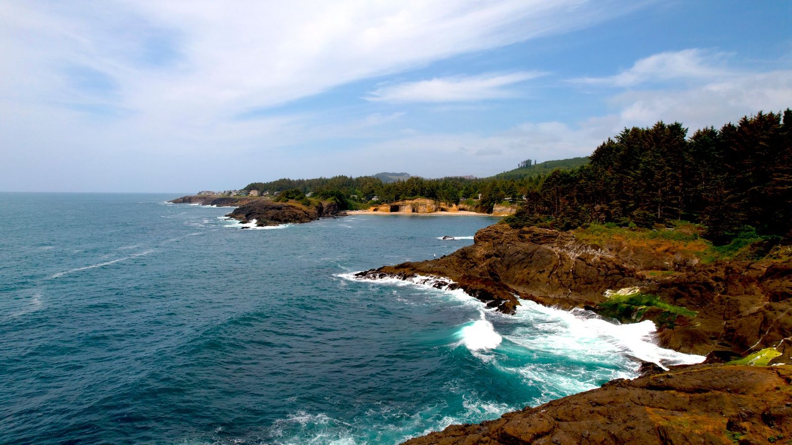 Discover the stunning coastal views of Depoe Bay, Oregon featuring cliffs, forests, and the expansive ocean