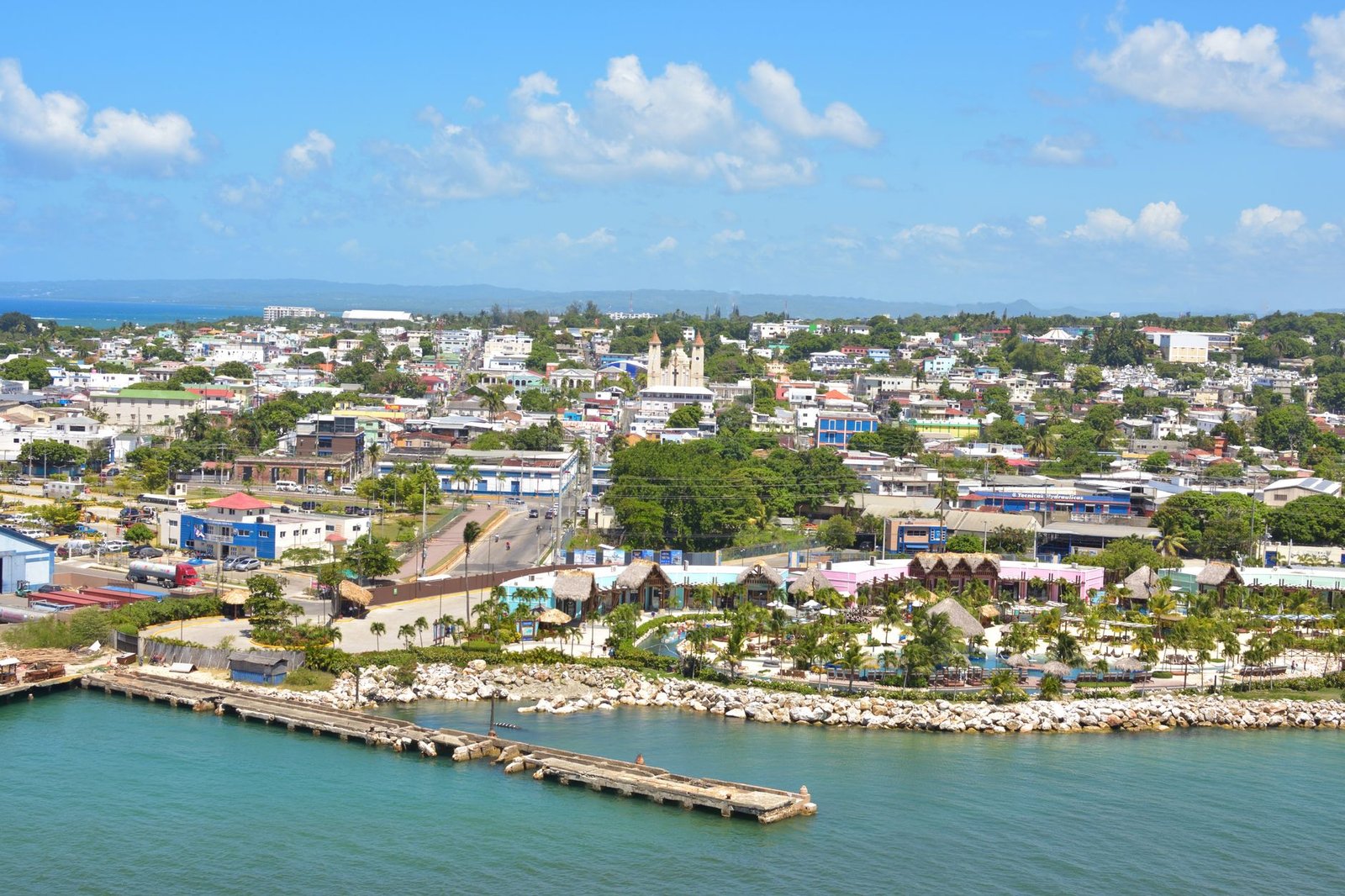 Explore the vibrant coastal landscape of Puerto Plata, Dominican Republic from above