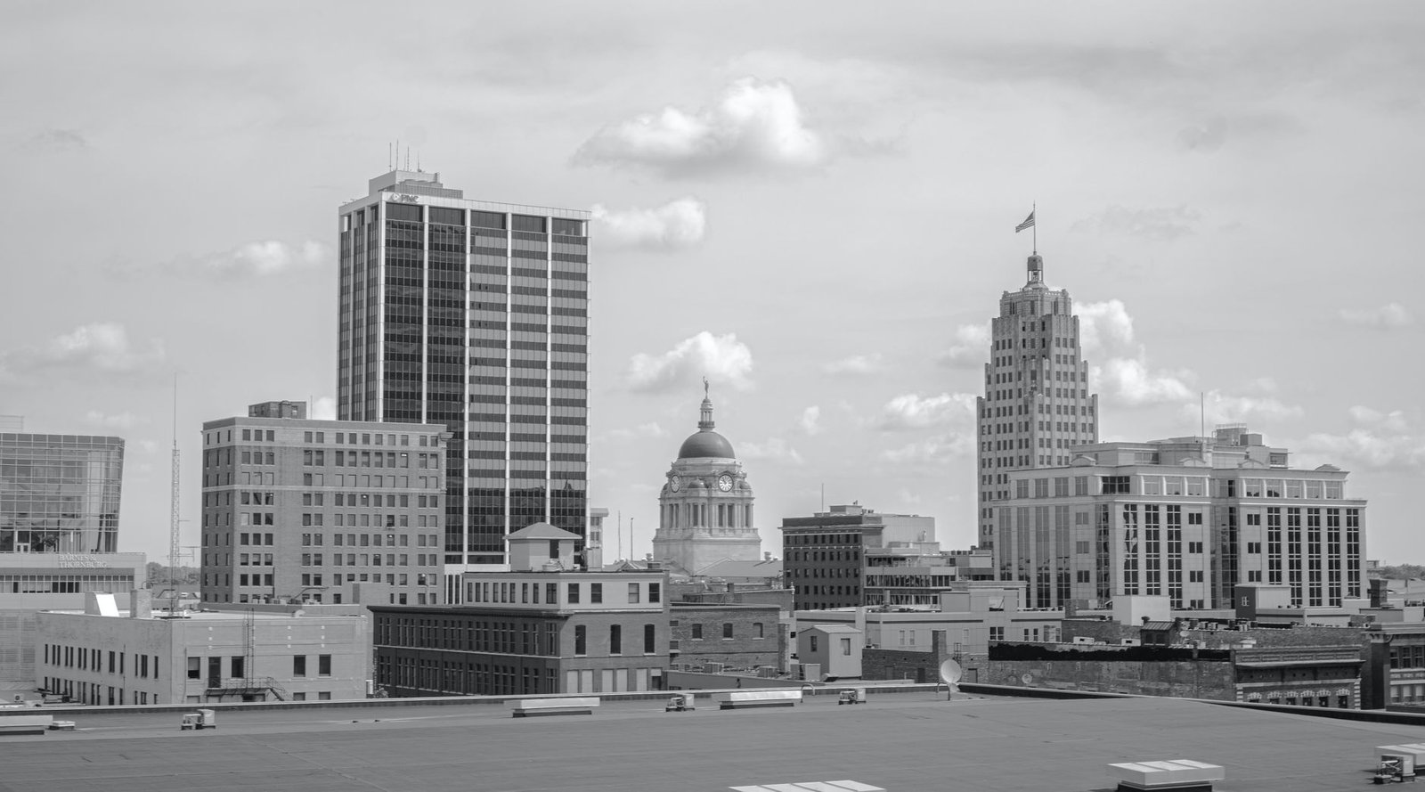Grayscale cityscape of Fort Wayne, Indiana showcasing prominent buildings and skyline