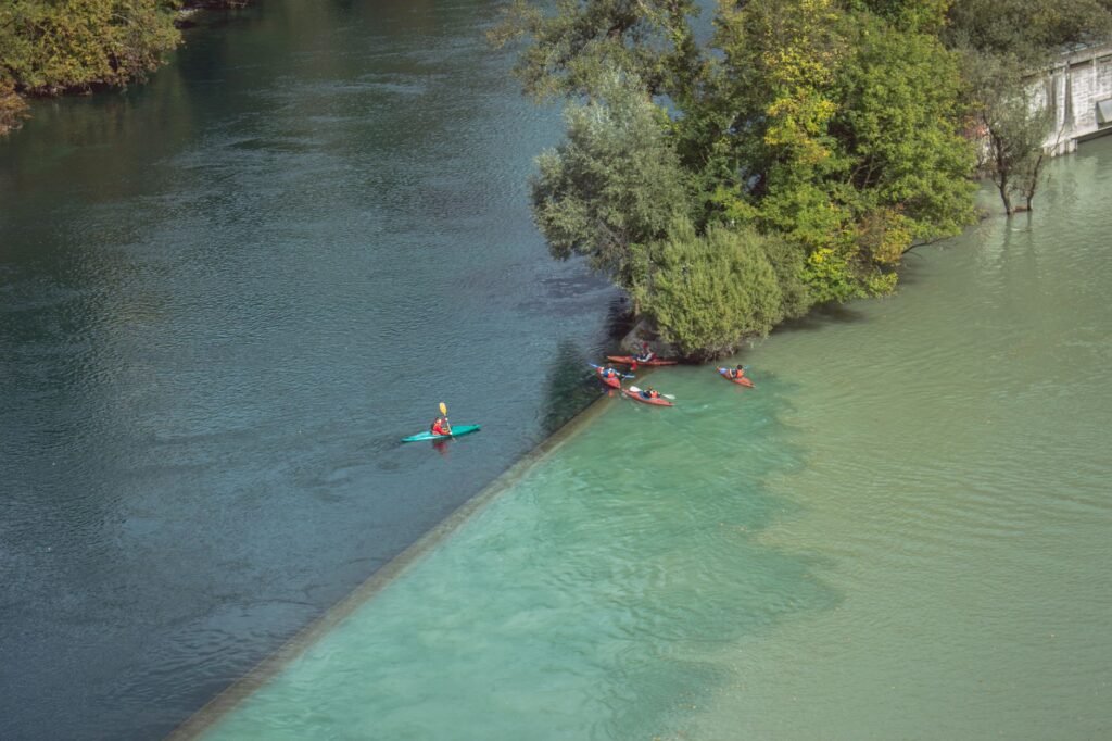 Kayakers glide down the gentle waters of the Guadalupe River, a popular spot for beginners and families