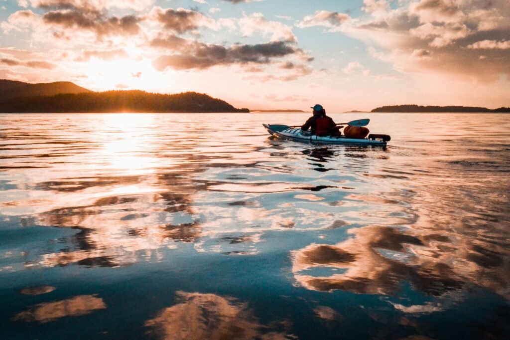 Kayakers glide past the cliffs of Apostle Islands near Bayfield