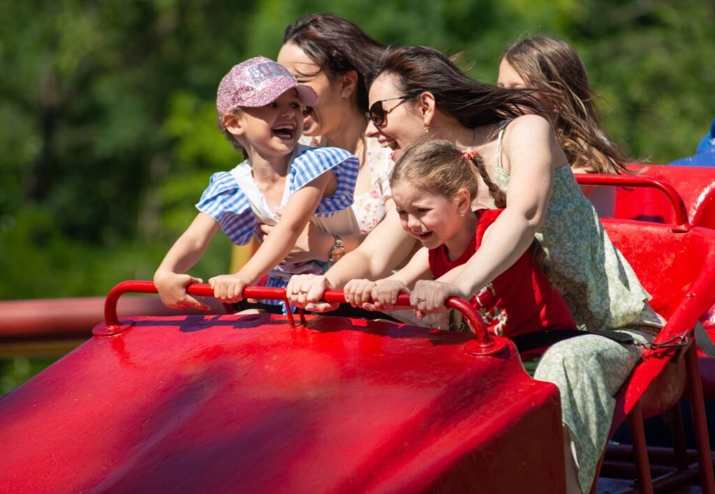 Kids screaming with joy on a family-friendly coaster