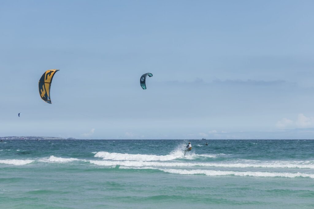 Kite surfers riding the steady trade winds on Bulabog Beach