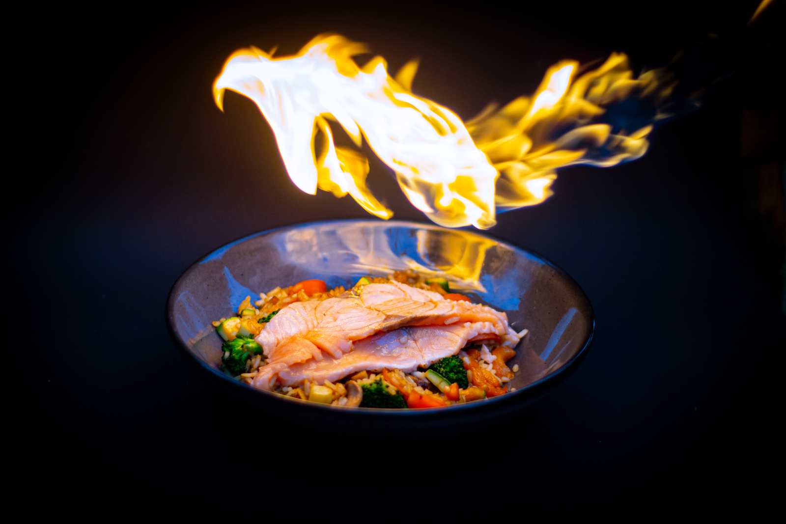 Experience a unique twist on Asian cuisine at **Wok & Grill**.