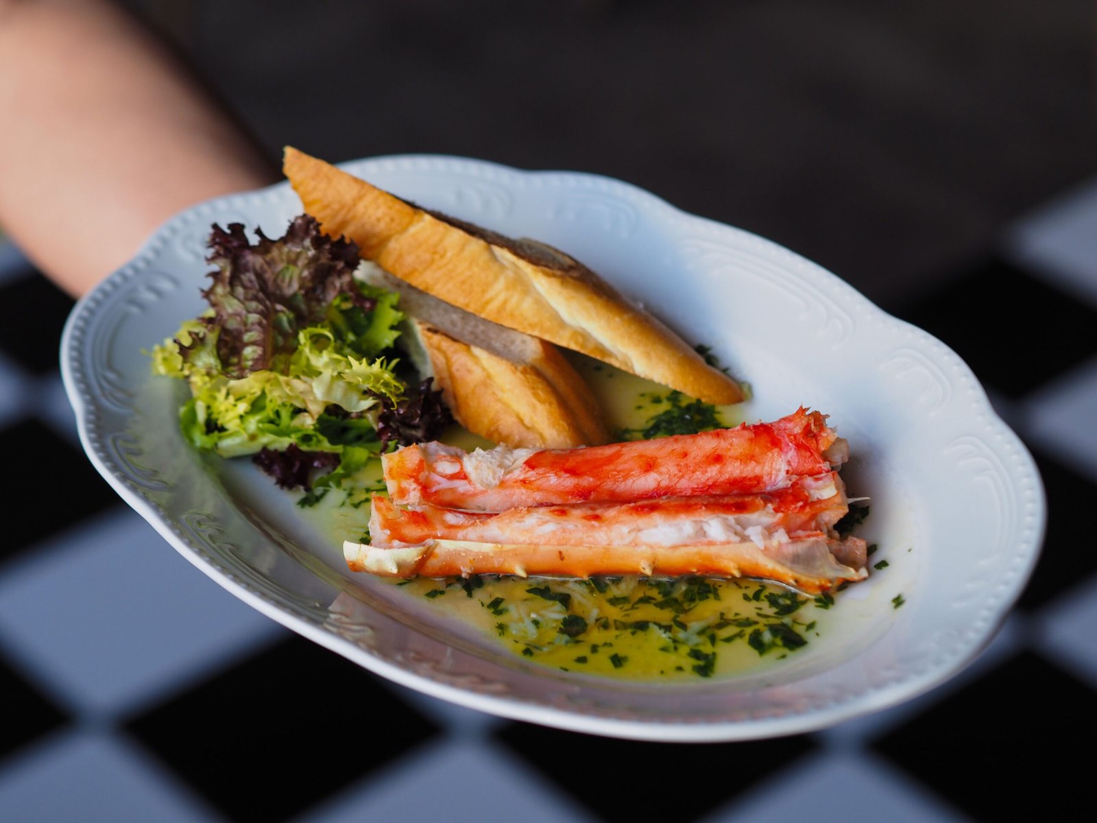Share a plate at Joe's Stone Crab for a classic seafood dining experience.