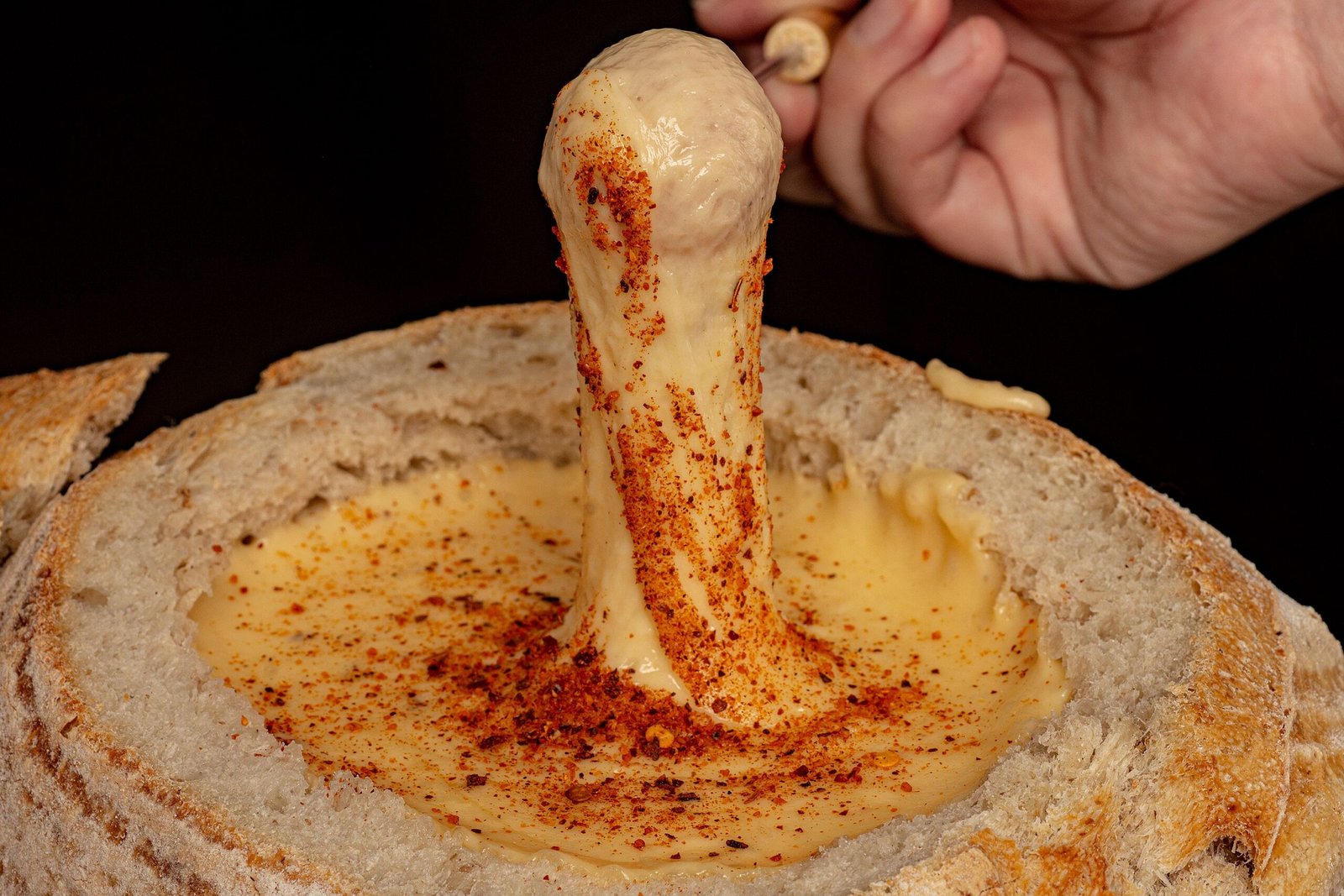 Experience an interactive dining experience at the Melting Pot fondue restaurant.