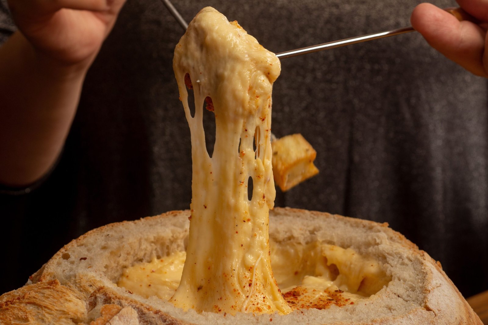 Savor a Mediterranean feast at The Melting Pot in New York City, featuring a fun fondue cooking experience.