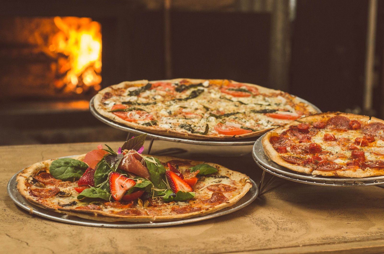 Indulge in wood-fired pizza at Wood Fired Pizza Company in Terminal B. Indulge in wood-fired pizza at Wood Fired Pizza Company in Terminal B.