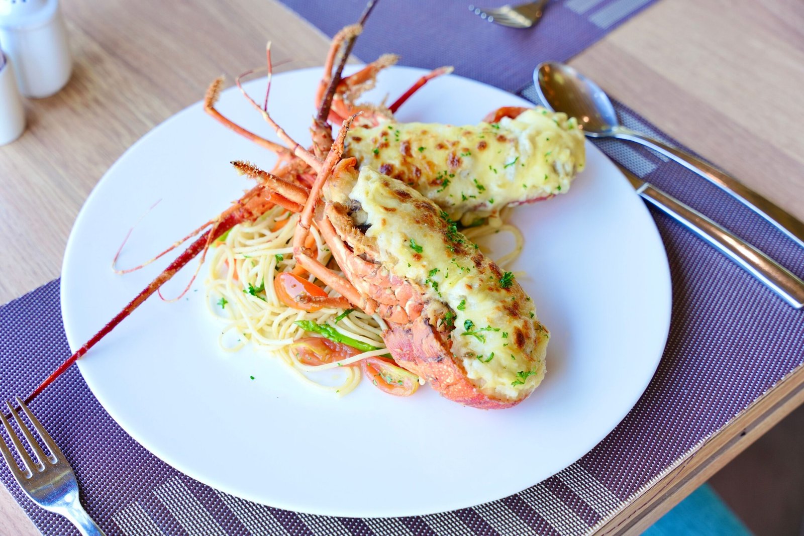 Treat yourself to fresh lobster spaghetti at **Doukato Restaurant** in Imerovigli. Treat yourself to fresh lobster spaghetti at **Doukato Restaurant** in Imerovigli.
