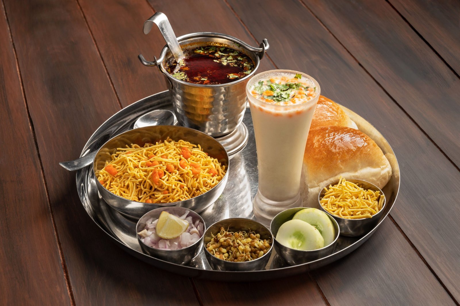 Hotel Saravana Bhavan - Indulge in a traditional South Indian thali at this iconic restaurant.