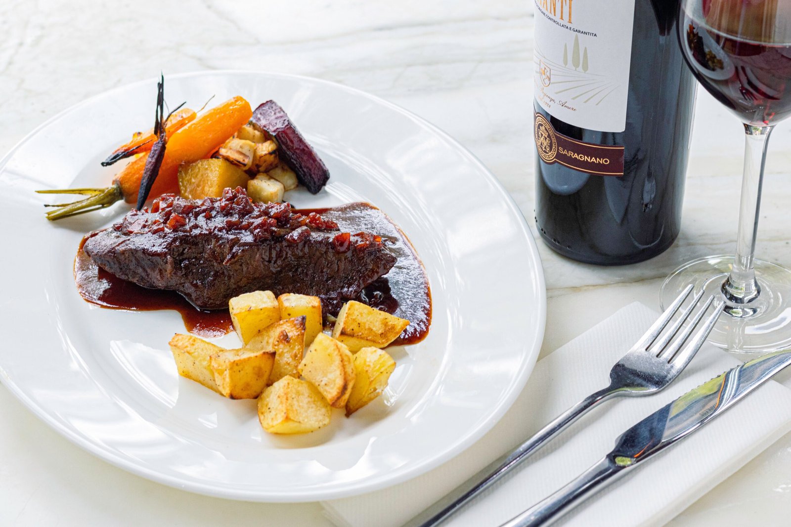 Savor the flavors of **The Bottle Room**, where you can enjoy wine pairings with your meal.