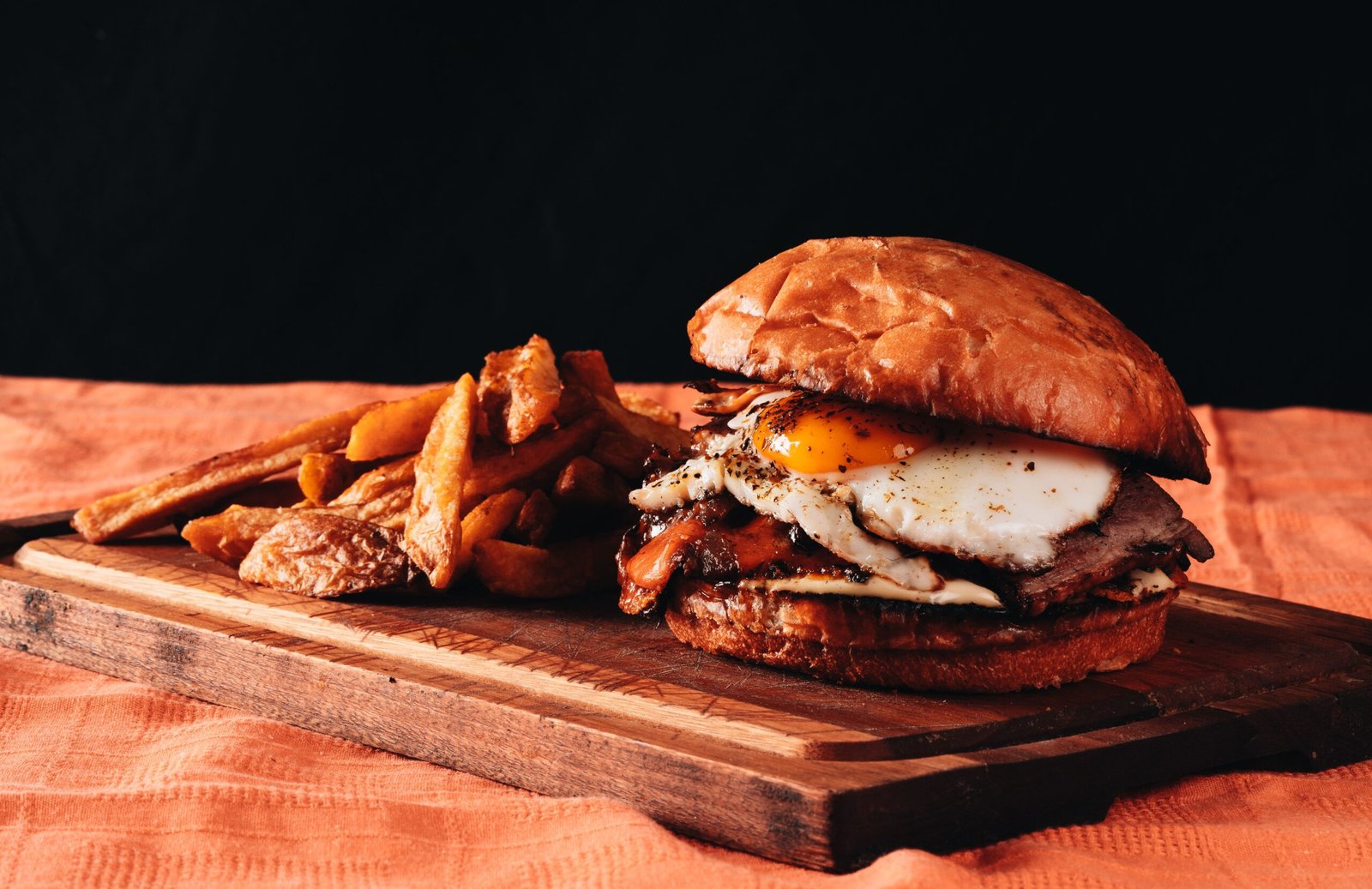 Indulge in gourmet burgers at The Blacksmith Inn in Egg Harbor.