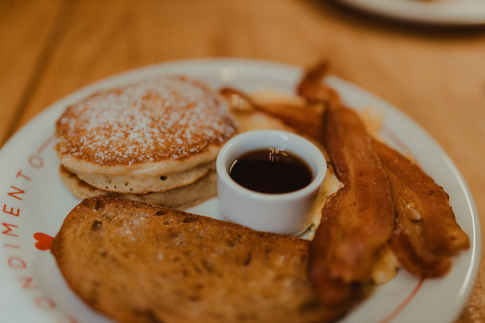 Enjoy a cozy atmosphere and hearty breakfast dishes at Log Cabin Pancake House.