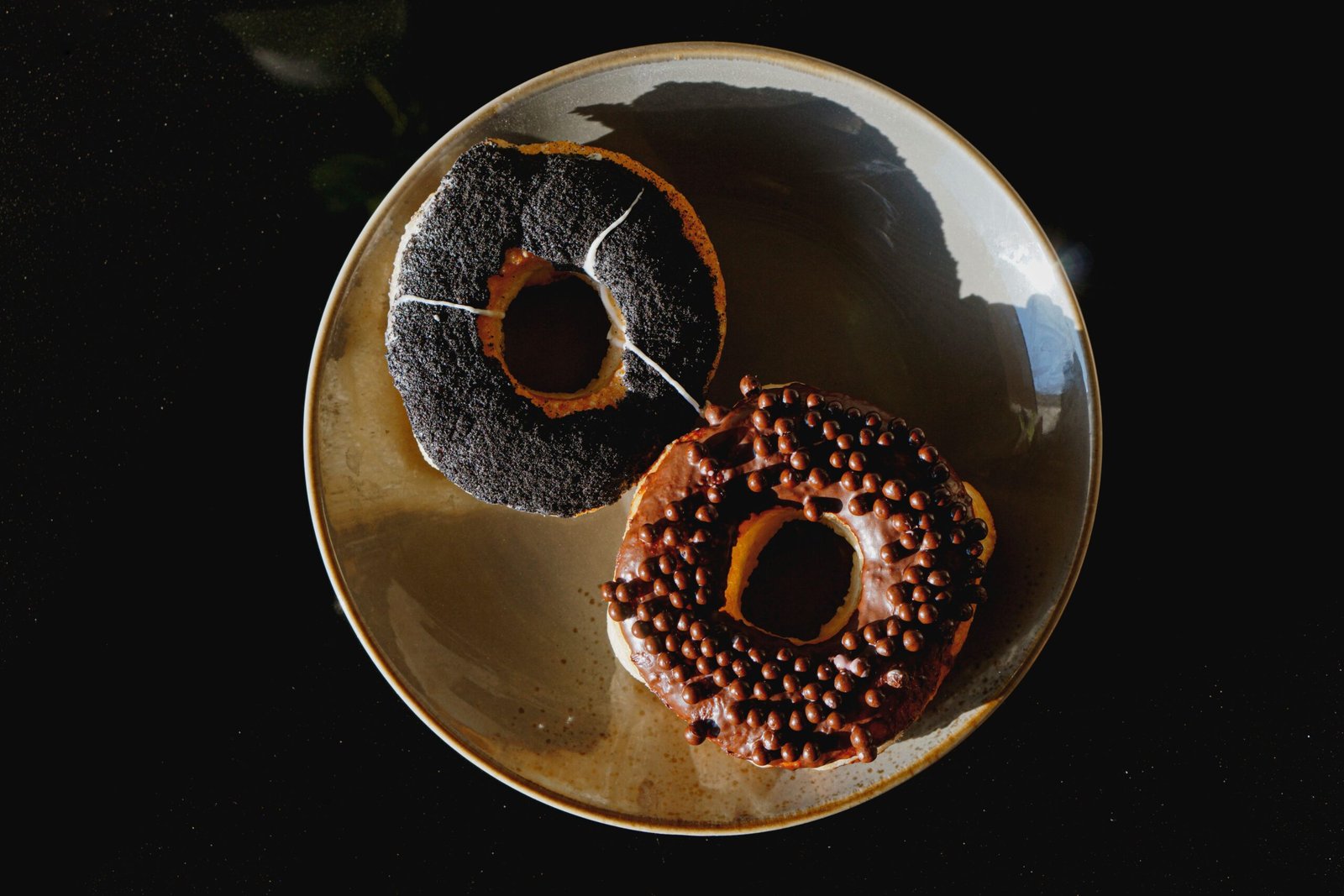 Savor gourmet donuts at **Hypnotic Donuts**, where eclectic flavors steal the show.