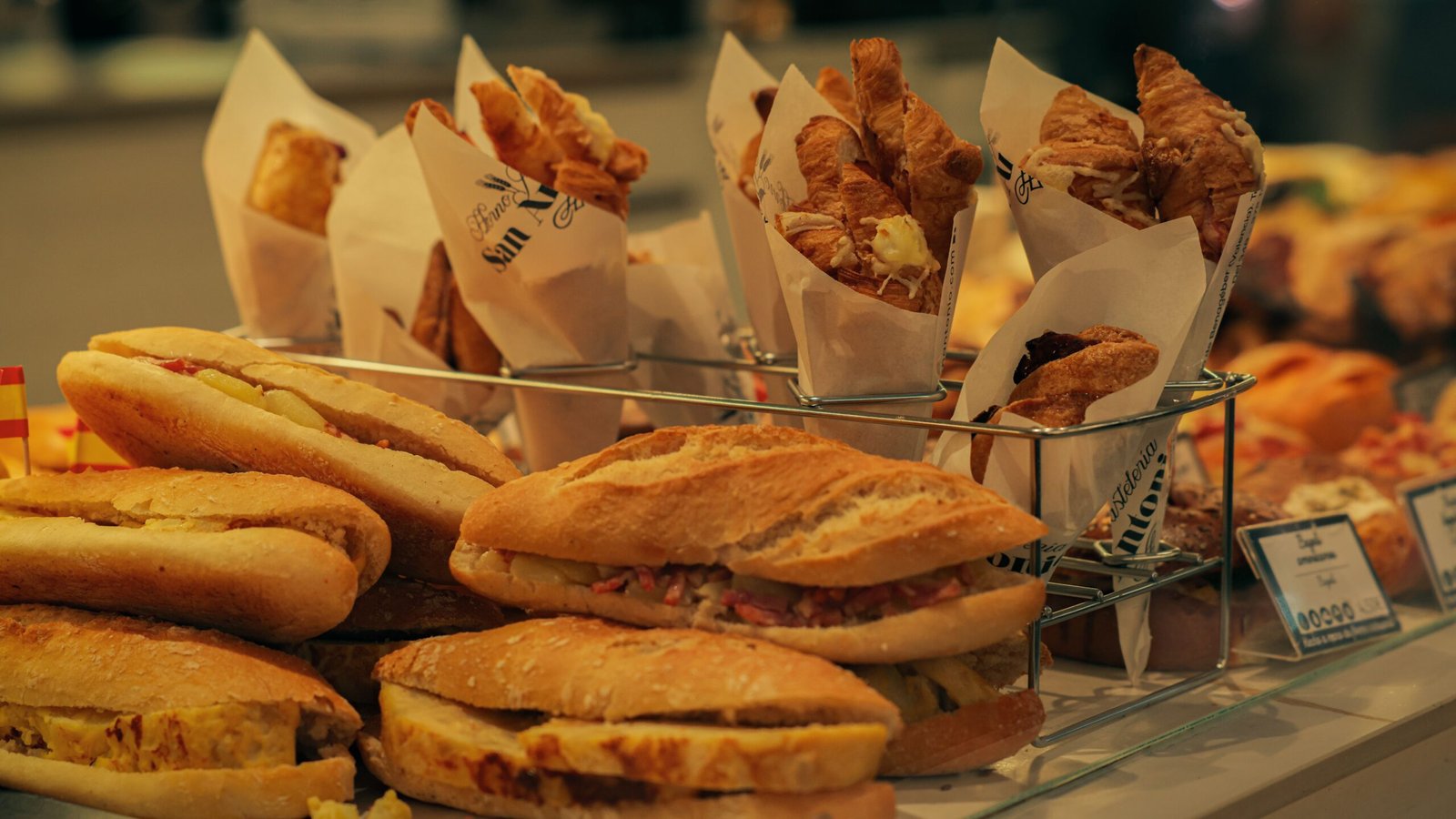 Savor classic French cuisine at Café Orleans, featuring their popular Monte Cristo sandwich.