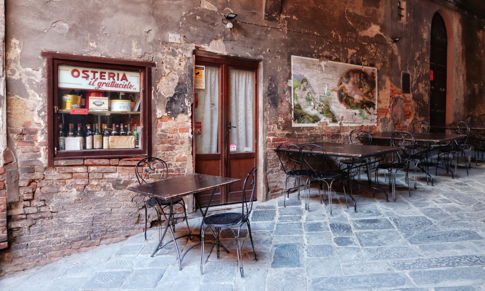 Enjoy gourmet Italian cuisine at **Osteria Tulia**, known for its rustic charm.