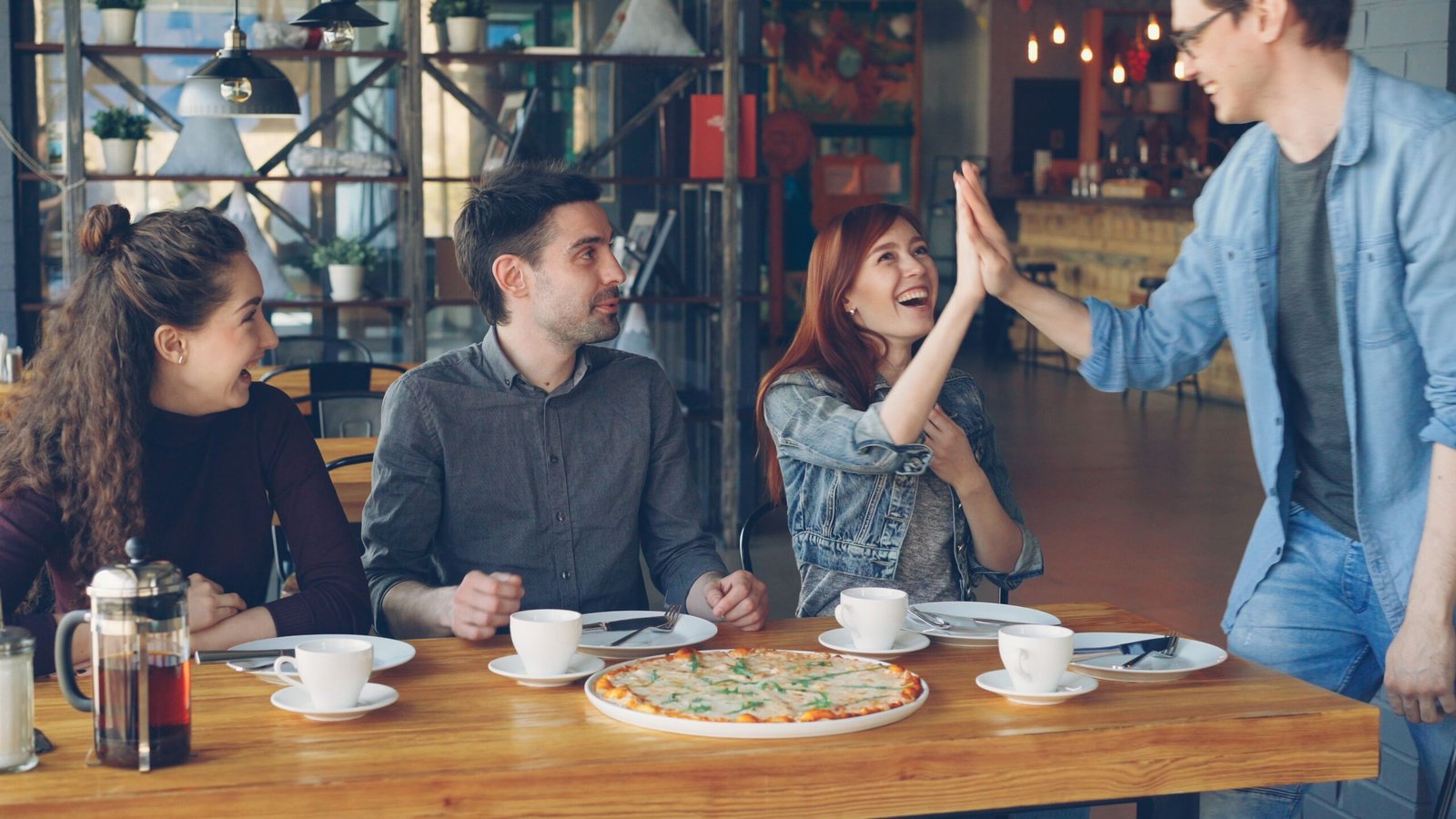 Relax with a coffee and breakfast at Five Points Pizza.