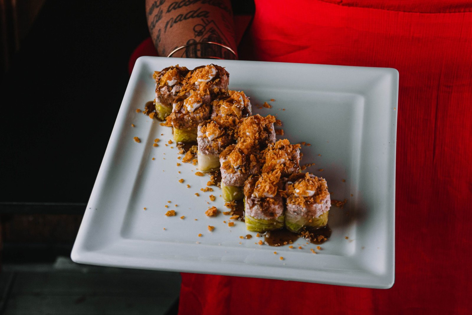 Indulge in a sushi feast at Kabooki Sushi, famed for its fresh ingredients and unique rolls.