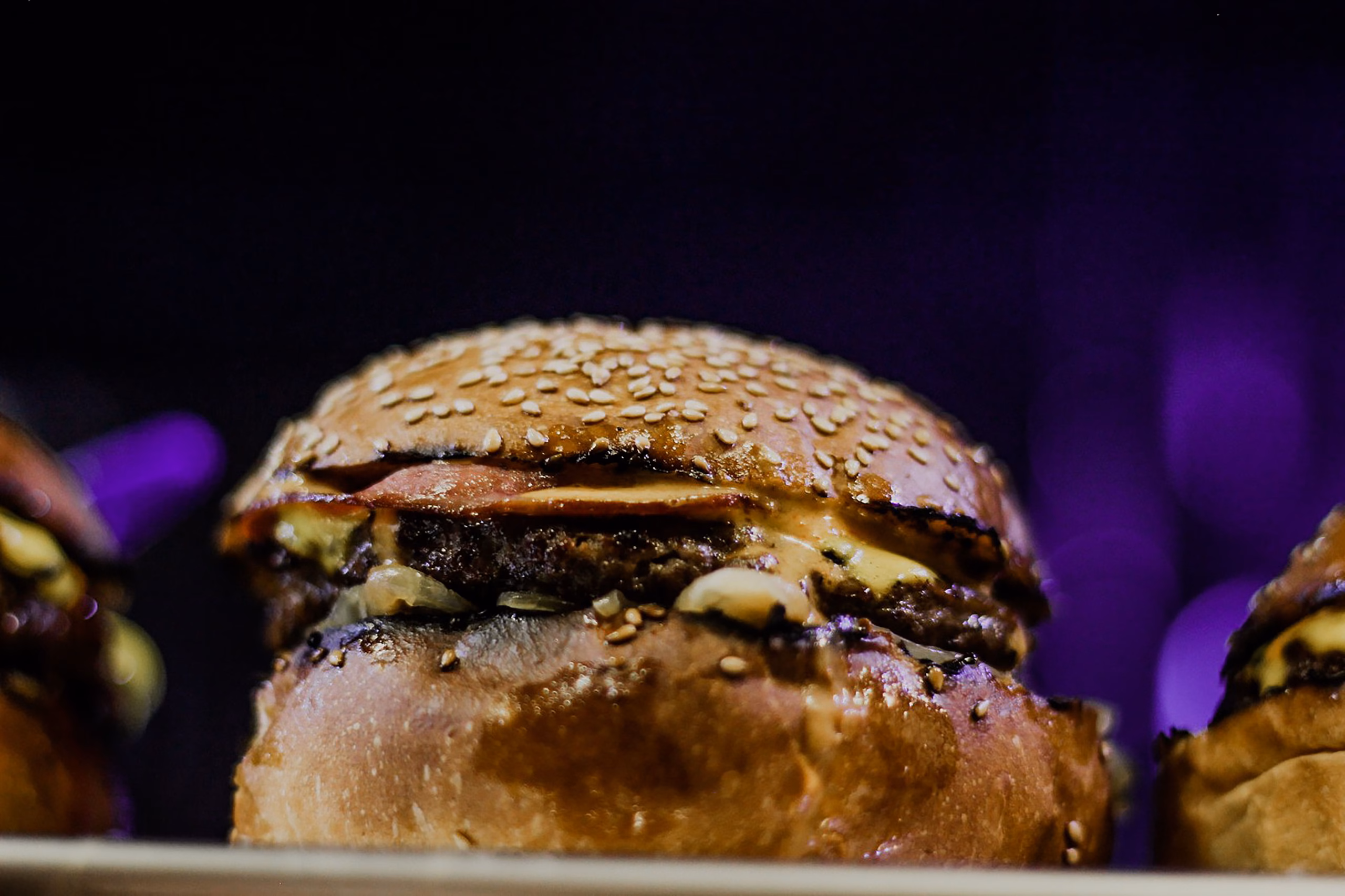 Experience gourmet burgers at Patty & Bun in Soho.