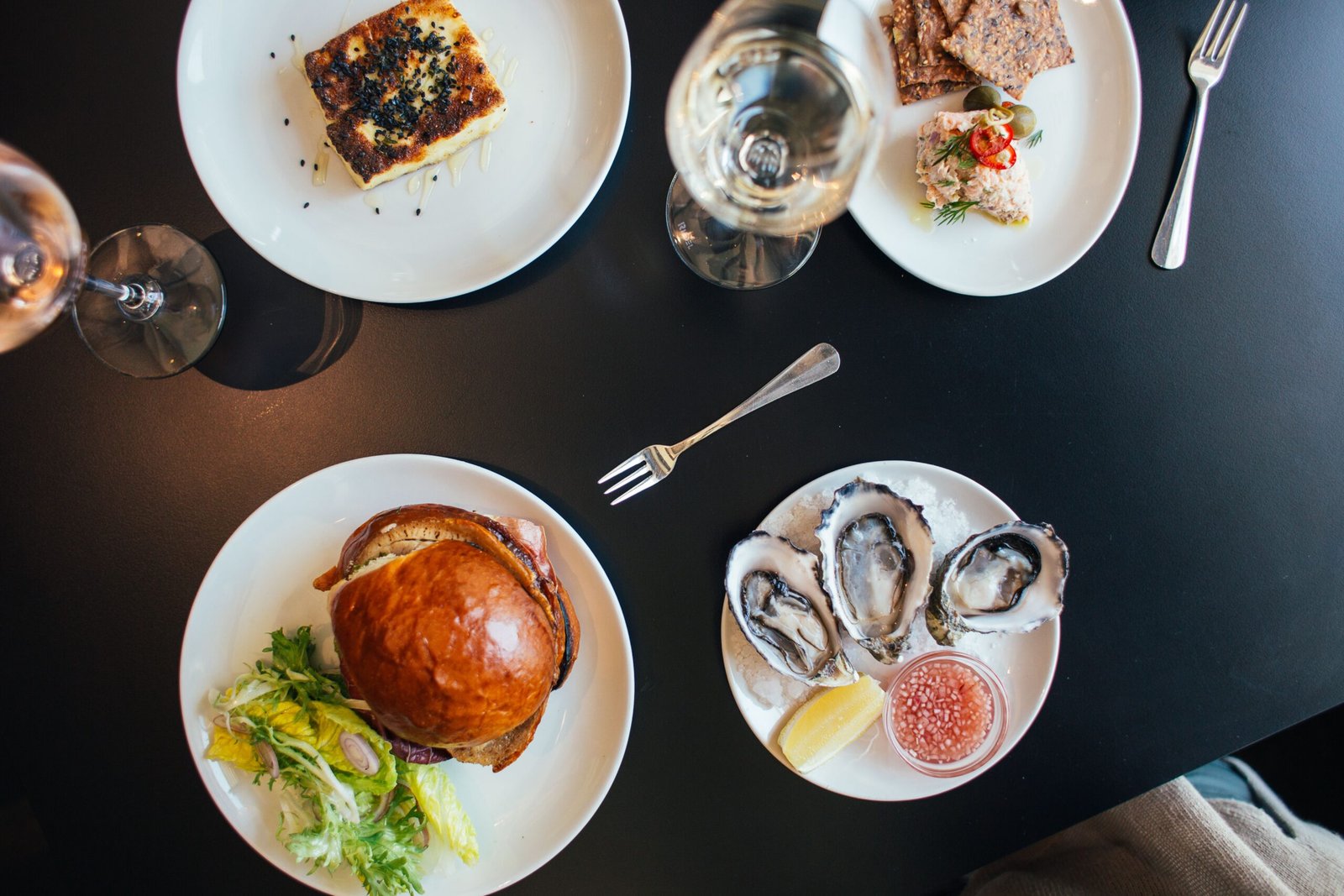 Grab a casual bite at **The Pot Luck Club**, famous for its creative small plates and vibrant dining experience. Grab a casual bite at **The Pot Luck Club**, famous for its creative small plates and vibrant dining experience.