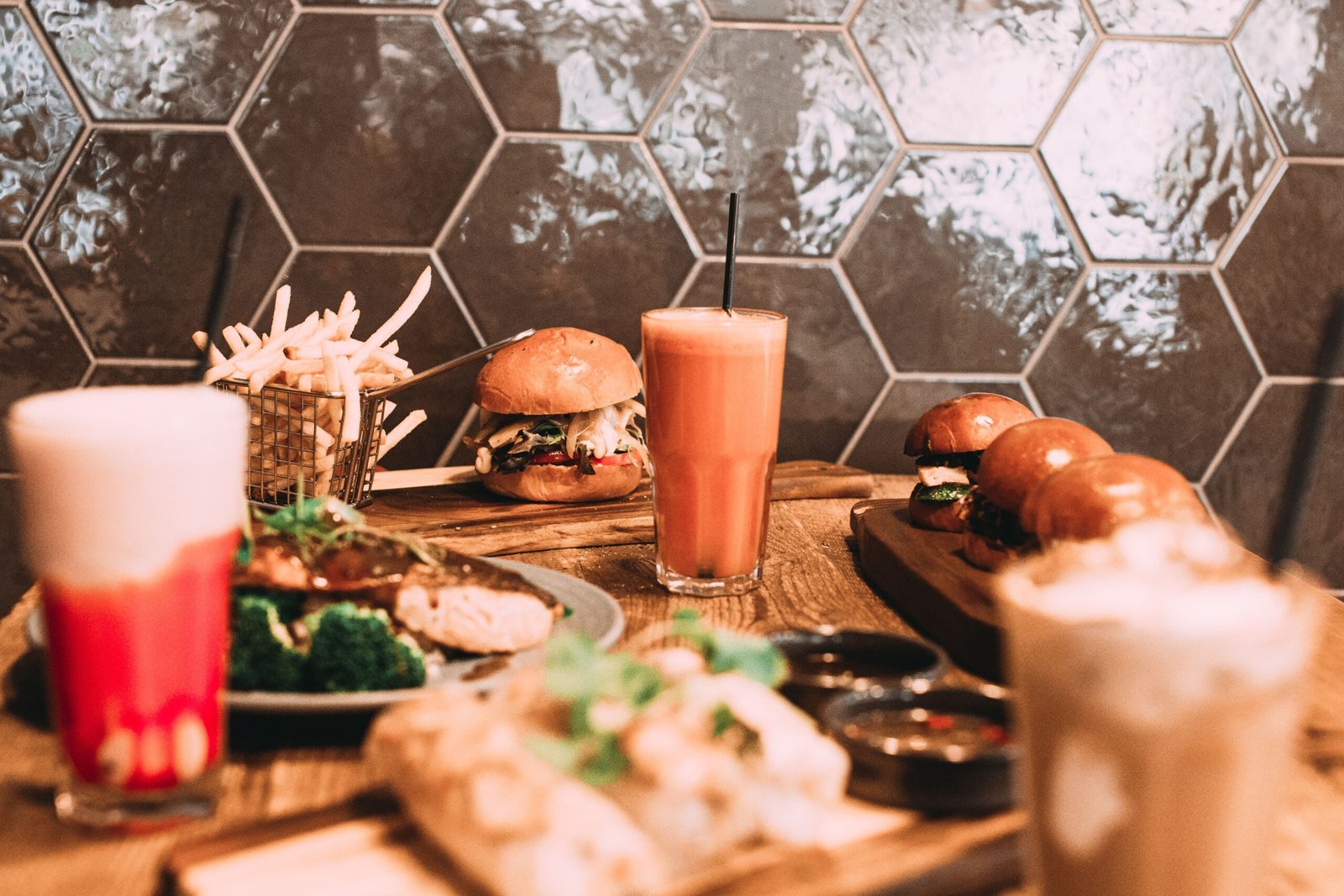 Relish gourmet burgers and milkshakes at **Fleur de Lis Pizza & Grill**.
