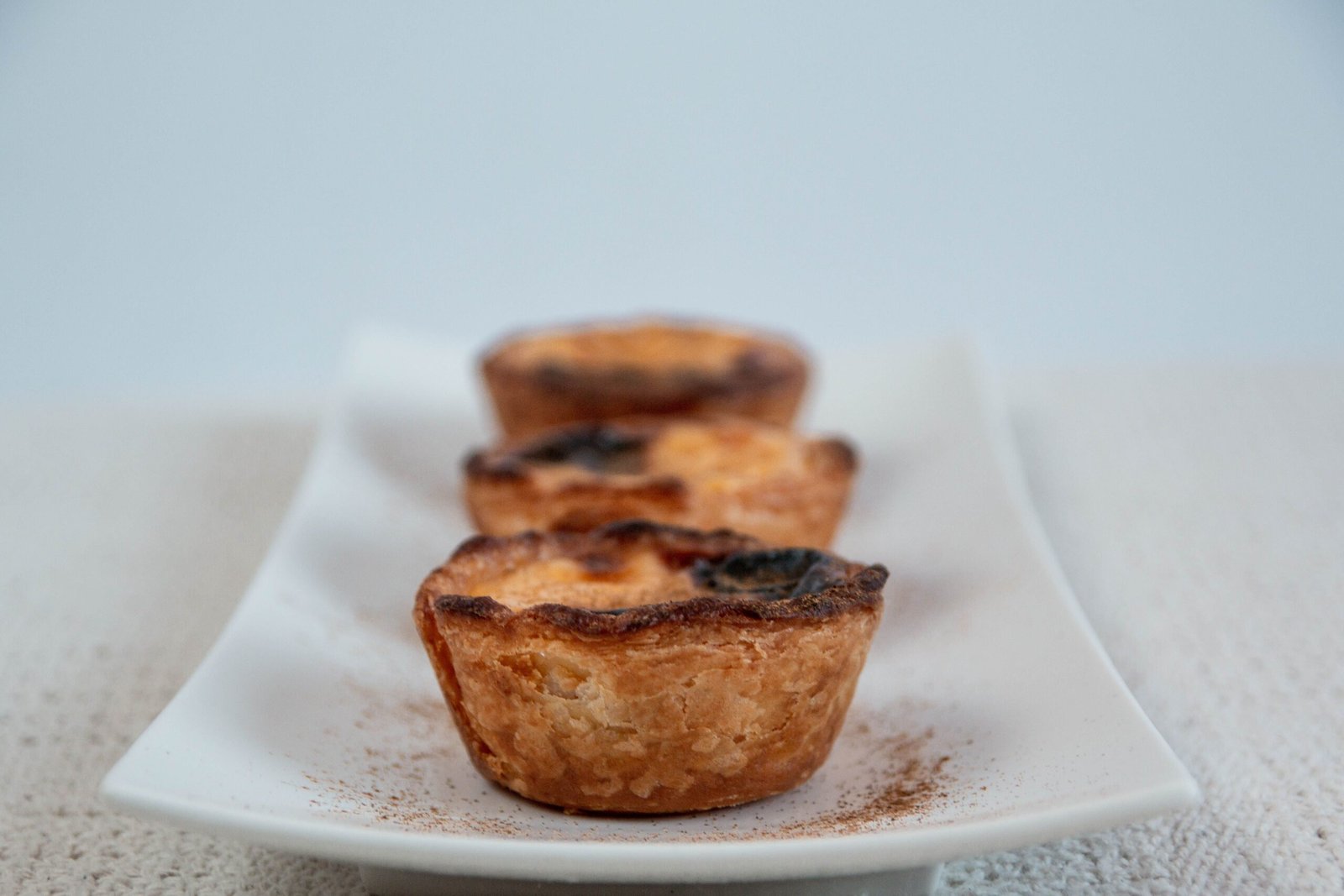 Delight in traditional Portuguese pastries at **Pastéis de Belém**, the birthplace of the famed custard tart. Delight in traditional Portuguese pastries at **Pastéis de Belém**, the birthplace of the famed custard tart.
