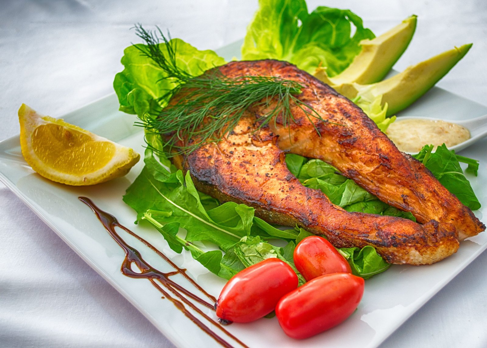 Savor fresh seafood dishes at the Riverside Grill Savor fresh seafood dishes at the Riverside Grill