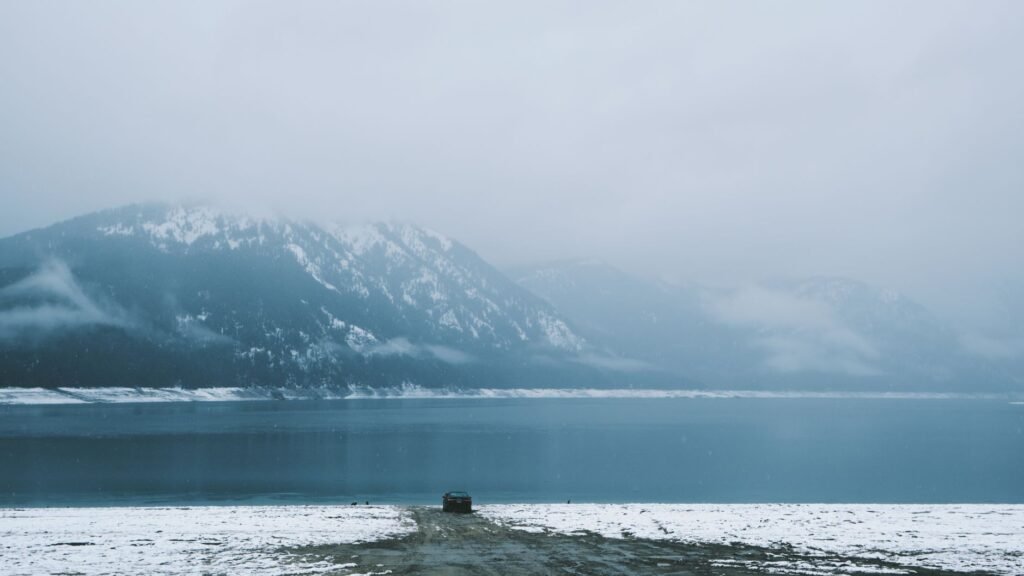 Snow‑capped peaks framing the town in the summer