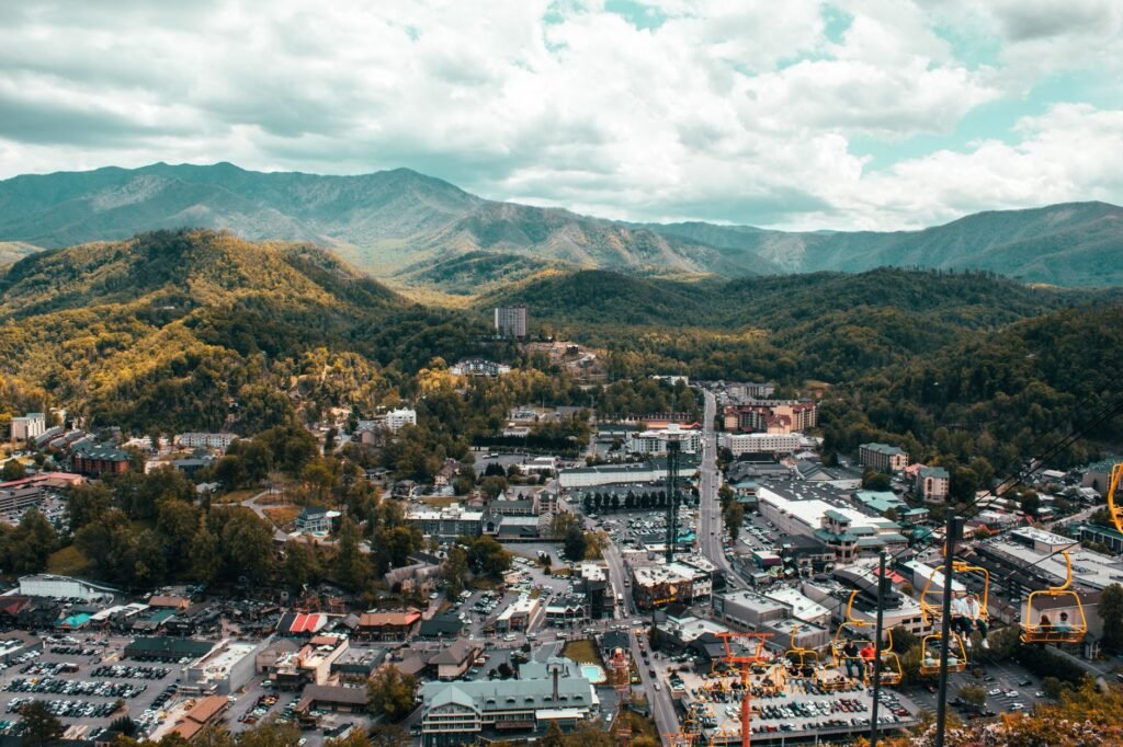 The bustling streets of Pigeon Forge framed by the Smoky Mountains