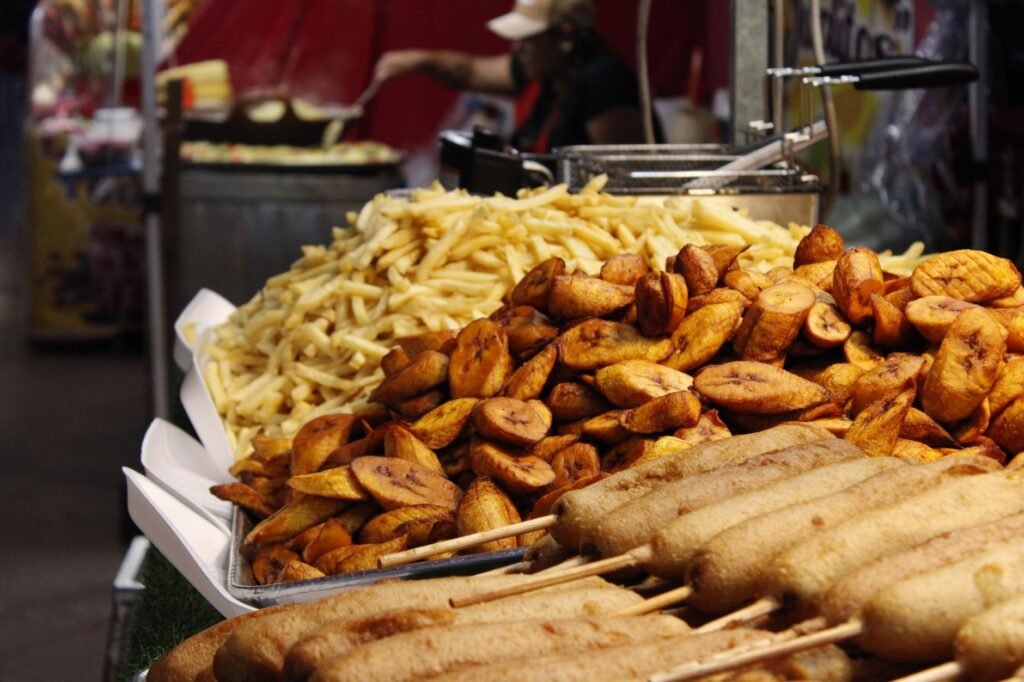 Vibrant local market stalls serving Caribbean dishes
