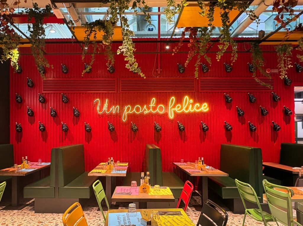 Vibrant restaurant setting with modern decor and neon lighting