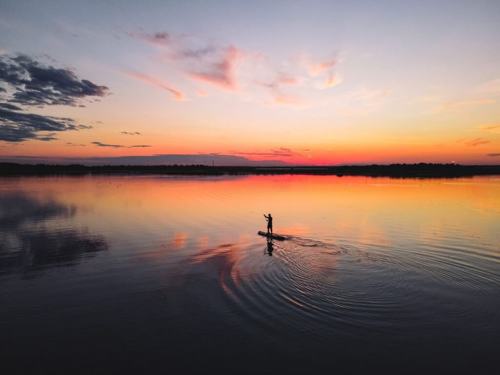 Visitors enjoying paddleboarding on Lake Rhodhiss